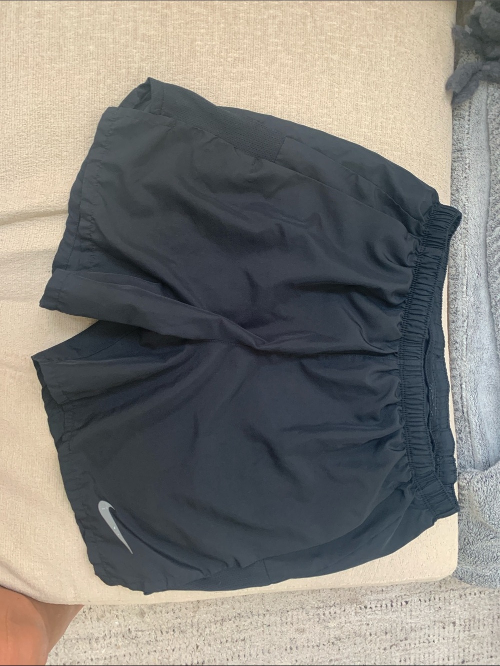 Nike Black men’s Athletic Shorts with Silver Swoosh two front pockets